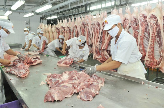 Meat processing at Vissan Company. (Photo: SGGP)