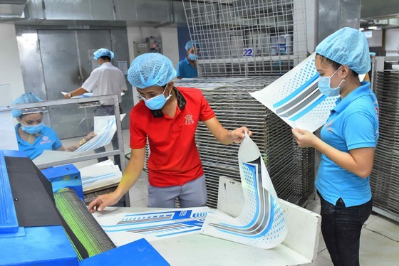 Production at Minh Man Printing Company is still stable despite the Covid-19 pandemic. (Photo: SGGP)