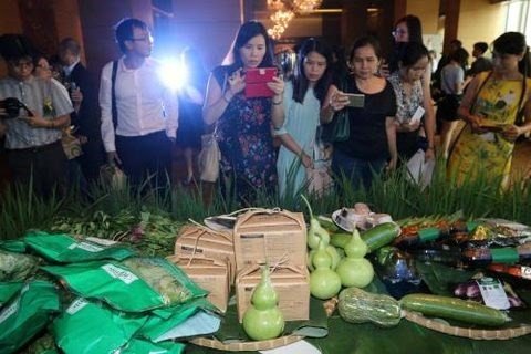 Saigon Co.op on May 8 unveiled the Co.op Organic brand and introduced four groups of organic products. (Photo: VNA)