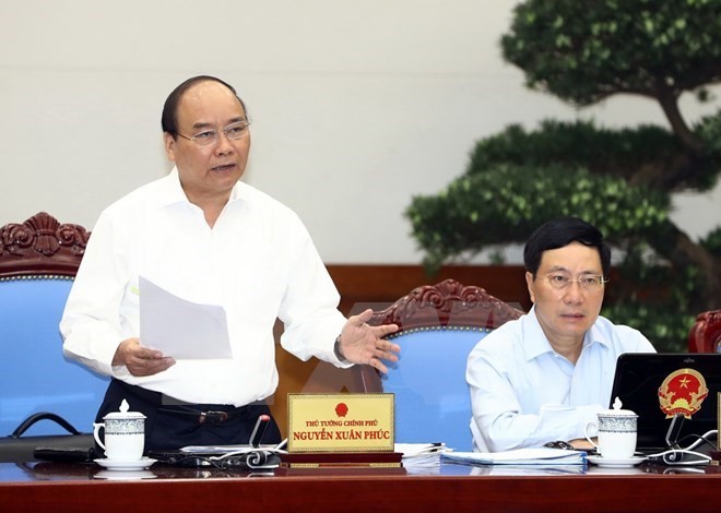 Prime Minister Nguyen Xuan Phuc speaks at the Government's meeting for July on August 3 (Photo: VNA)