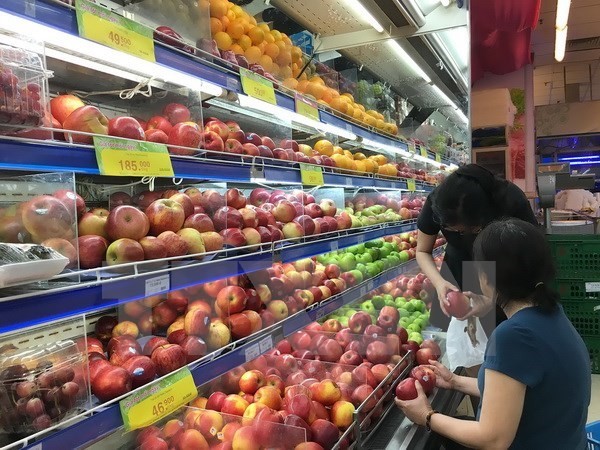 Vietnamese consumers choose products with clear origin. The application of Global Standard One (GS1) number and bar coding is significant to getting to grips with food traceability and safety. (Photo: VNA)