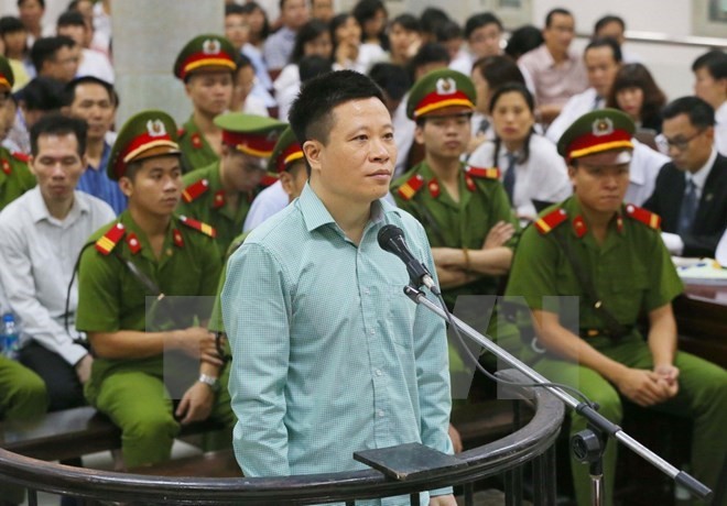 Former OceanBank Chairman Ha Van Tham in court (Source: VNA)