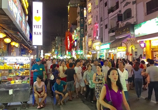 B​ui Vien Walking Street in HCM City’s District 1 has become a popular spot for locals and international tourists. (Photo: VNA)