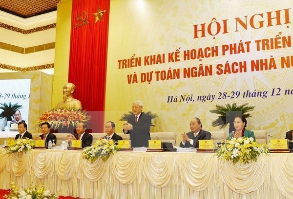 General Secretary of the Communist Party of Vietnam Central Committee Nguyen Phu Trong, President Tran Dai Quang and National Assembly Chairwoman Nguyen Thi Kim Nga attend the Government meeting with localities (Photo: VNA)