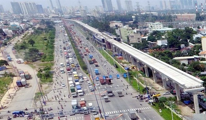 An elevated section of HCM City’s Ben Thanh – Suoi Tien metro line runs along Hanoi Highway. (Photo: VNA)