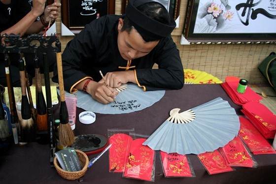 HCM City’s calligraphy street for Tet has been held for 12 consecutive years.  (Photo: Sggp)