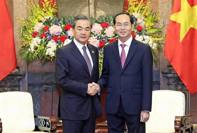 President Tran Dai Quang (R) and Foreign Minister of China Wang Yi (Source: VNA)