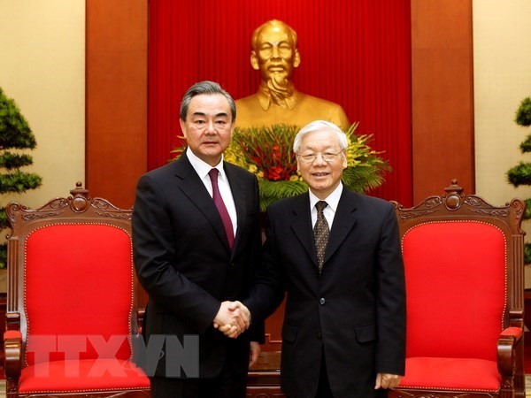 eneral Secretary of the Communist Party of Vietnam Nguyen Phu Trong (R) receives Chinese State Councillor and Foreign Minister Wang Yi in Hanoi on April 2 (Photo: VNA)