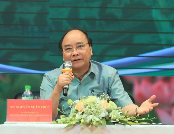 Prime Minister Nguyen Xuan Phuc speaks at the dialogue with farmers (Source: VNA)