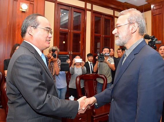 Secretary of the HCM City Party Committee Nguyen Thien Nhan (L) and Speaker of the Parliament of Iran Ali Ardeshir Larijani. (Photo: Sggp)