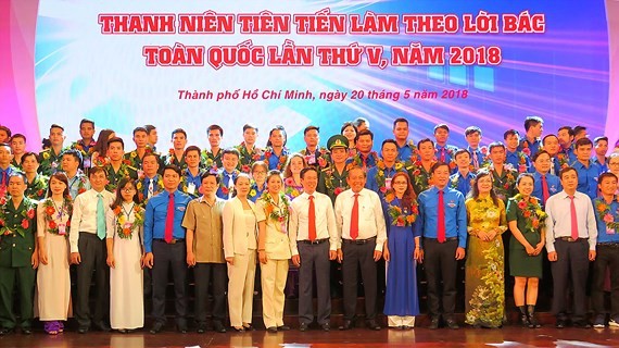 Outstanding young people nationwide in the campaign “Young people study and work in accordance with Uncle Ho’s teachings” are honored in Ho Chi Minh City. (Photo: Sggp)