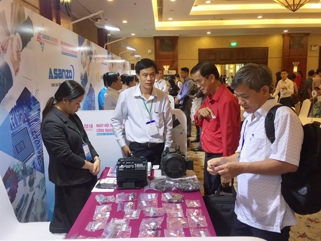A sourcing fair to link Vietnamese supporting industries with FDI and other manufacturing firms held recently by the HCM City Department of Industry and Trade (Photo: VNA)