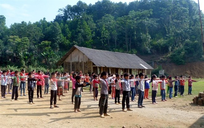 Students at Dao Vien Primary School in Yen Son District of the northern mountainous province of Tuyen Quang take part in a morning exercise session. (Photo:VNA)