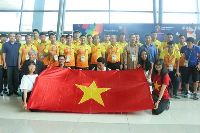 The Vietnamese team at the airport (Source: VNA)