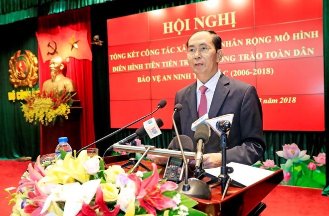 President Tran Dai Quang calls on the whole Party, people and army to heighten revolutionary vigilance and combating spirit to firmly defend national security. (Photo: VNA)