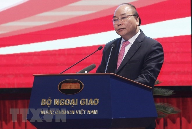 Prime Minister Nguyen Xuan Phuc speaks at a plenary session of the 30th Diplomatic Conference on August 15. (Photo: VNA)