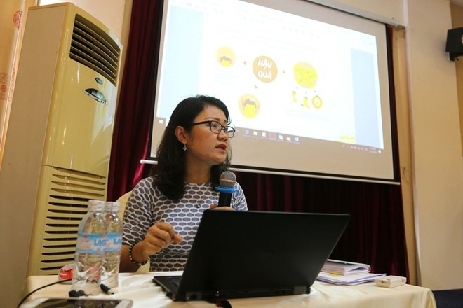 Le Thi Lan Phuong, a programme officer at UN Women Vietnam, speaks at the workshop (Photo: VNA)