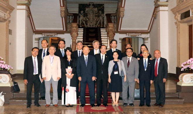 Officials of HCM City and representatives of the International Friendship Exchange Council of Japan pose for a photo (Photo: VNA)