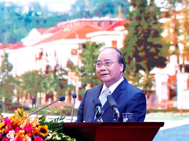 Prime Minister Nguyen Xuan Phuc delivers a speech at the trade, investment and tourism promotion conference of Lao Cai province on July 20 (Photo: VNA)