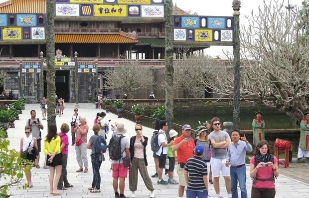 Foreign visitors at a tourism destination in Thua Thien - Hue  province (Source: VNA)