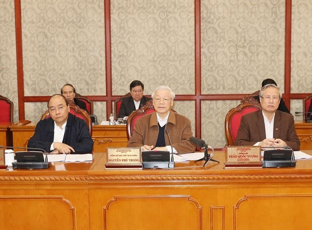 Party General Secretary and President Nguyen Phu Trong (centre) chairs the Politburo’s meeting on the COVID-19 prevention and control in Hanoi on March 20 (Photo: VNA)