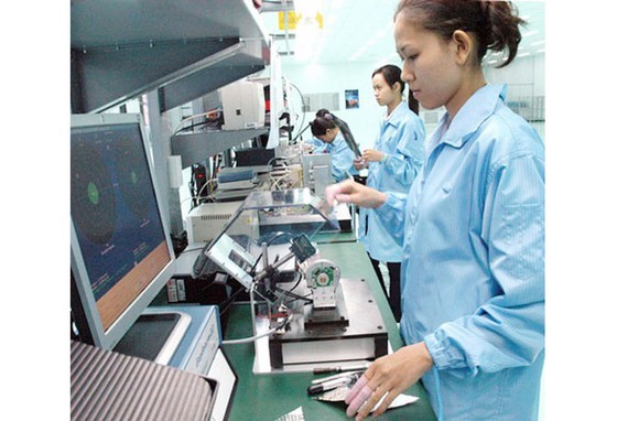  Employees are working at Datalogic Scanning Vietnam LLC in the Saigon Hi-Tech Park. (Photo: SGGP)