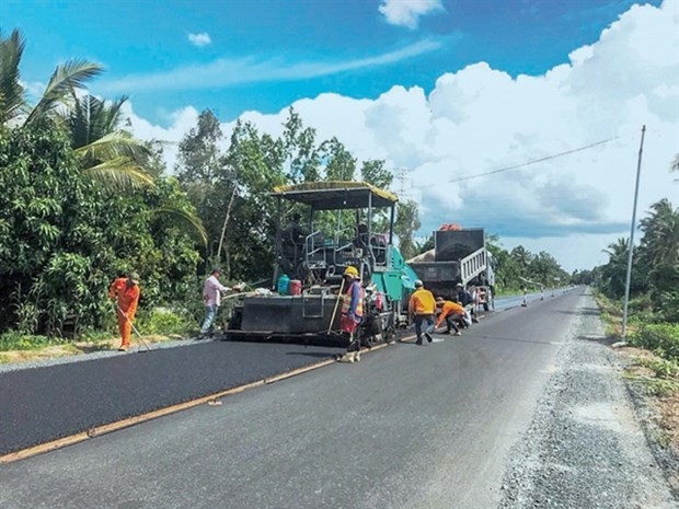 Workers speed up construction on Quan Lo - Phung Hiep National Highway (Photo courtesy of Ministry of Transport)