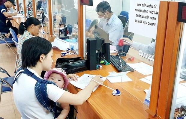 Vietnam’s social security system is believed to be a useful tool for economic and social stabilisation in 2021. - Illustrative image (Photo: VNA)