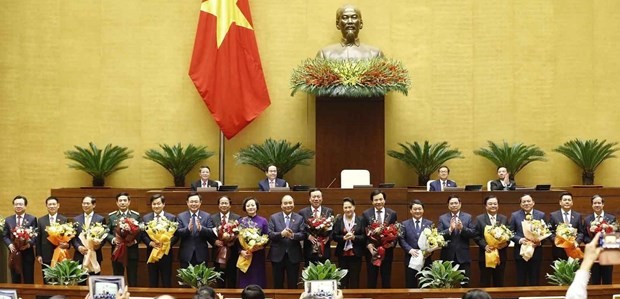 Leaders of Vietnam and the newly-appointed Government members pose for a group photo on April 8 morning (Photo: VNA)