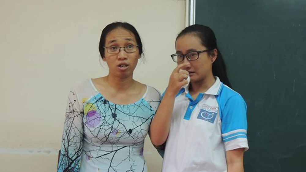 Cô giáo Trần Thị Minh Châu và học sinh Phạm Song Toàn 