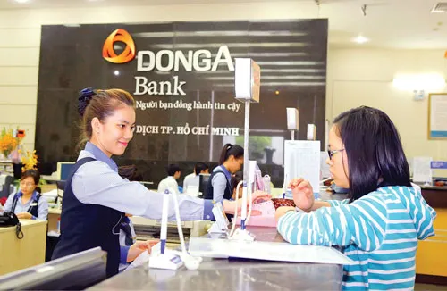 DongABank từng đưa ra kế hoạch niêm yết lên sàn từ trước năm 2008 nhưng đến nay vẫn chưa xác định thời điểm lên sàn. Ảnh: LONG THANH DongABank từng đưa ra kế hoạch niêm yết lên sàn từ trước năm 2008 nhưng đến nay vẫn chưa xác định thời điểm lên sàn. Ảnh: LONG THANH