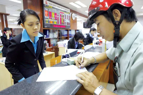 Tái cấu trúc NH sẽ không phân biệt quy mô nhỏ hay lớn. Ảnh: LÃ ANH Tái cấu trúc NH sẽ không phân biệt quy mô nhỏ hay lớn. Ảnh: LÃ ANH