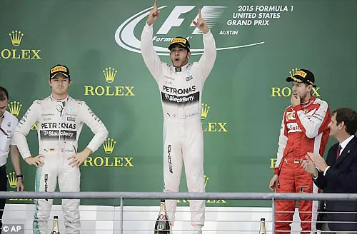 Chiến thắng tại United States GP giúp Hamilton (giữa) vô địch F1 2015 sớm 3 chặng. Chiến thắng tại United States GP giúp Hamilton (giữa) vô địch F1 2015 sớm 3 chặng.