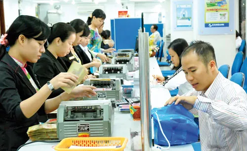 Các điều kiện thành lập NH mới đang được siết lại chặt chẽ hơn. Ảnh: CAO THĂNG Các điều kiện thành lập NH mới đang được siết lại chặt chẽ hơn. Ảnh: CAO THĂNG