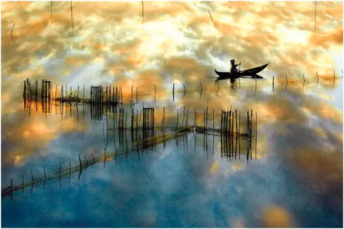 Hoàng hôn hồ Lăk ở Buôn Mê Thuột. Ảnh: Hoàng Quốc Tuấn