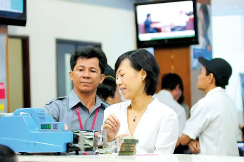 Thời CK huy hoàng, TTCK vẫn lệ thuộc vào nguồn vốn ngân hàng. Ảnh: VIỆT DŨNG Thời CK huy hoàng, TTCK vẫn lệ thuộc vào nguồn vốn ngân hàng. Ảnh: VIỆT DŨNG