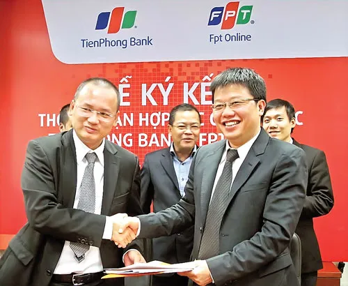 Một buổi lễ ký kết hợp tác giữa FPT Online với TienPhong Bank.