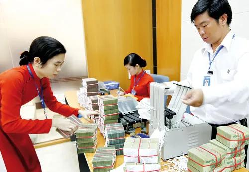 Nguồn vốn huy động dồi dào, nhưng tìm đầu ra không dễ. Ảnh: LÃ ANH