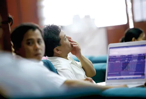 NĐT phải chịu rủi ro từ việc CTCK cắt magin đột ngột. Ảnh: LÃ ANH