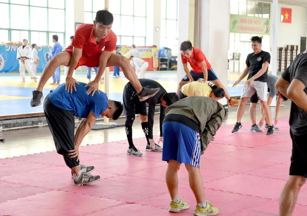 Quên đi đại dịch cúm, các tuyển thủ nỗ lực luyện tập chờ vòng loại Olympic ảnh 2