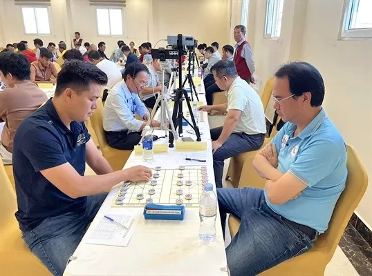 Hai kỳ thủ Lại Lý Huynh và Nguyễn Thành Bảo được mời dự giải đấu năm nay. Ảnh: MINH THẮNG