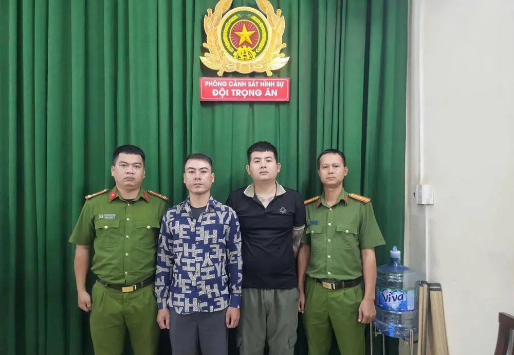 Hoàng Ngọc Sơn và Cao Thanh Lập bị bắt giữ. Ảnh: CA z6961528933779_beea2d6268285b433b4aeb2315054005.jpg