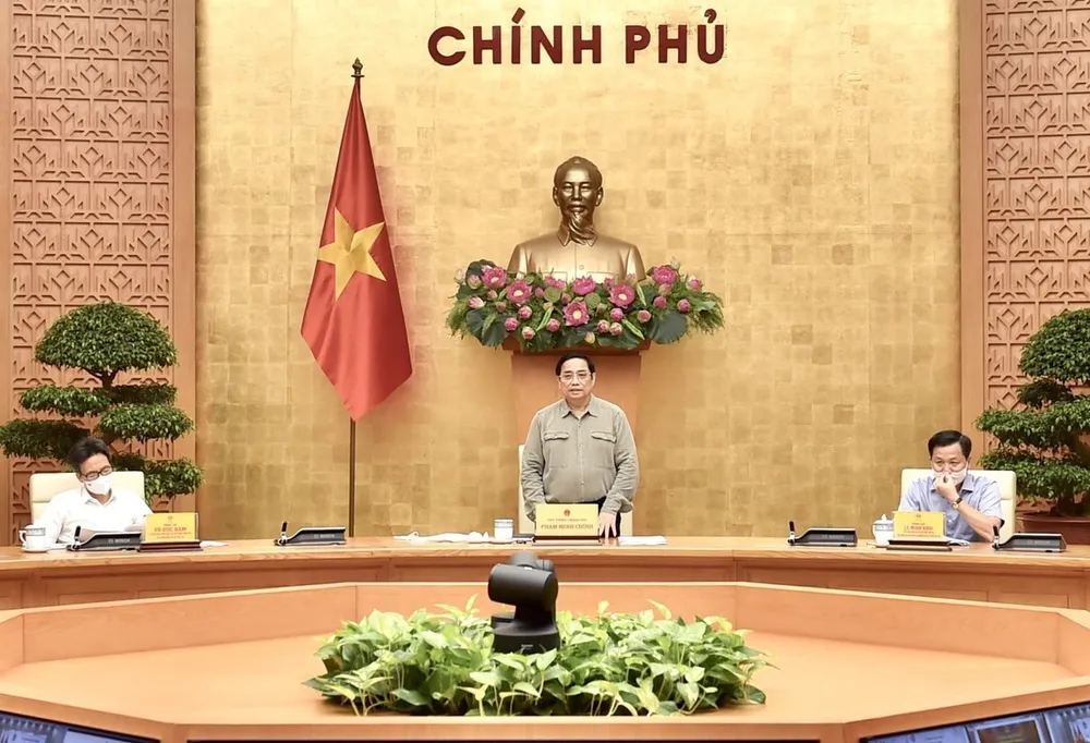 Thủ tướng chủ trì cuộc họp trực tuyến toàn quốc của Ban Chỉ đạo quốc gia phòng chống Covid-19 với các địa phương ngày 9-10. Ảnh: VIẾT CHUNG