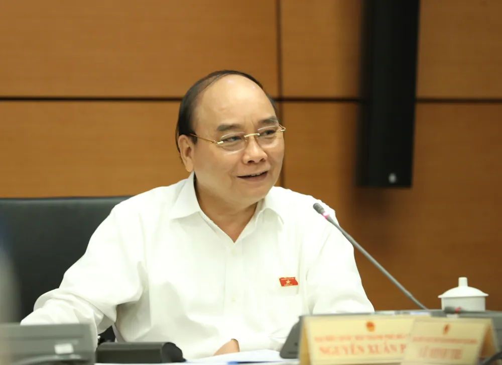 Chủ tịch nước Nguyễn Xuân Phúc: Đồng tình lùi thời điểm tăng lương cơ sở ảnh 2 Chủ tịch nước Nguyễn Xuân Phúc: Đồng tình lùi thời điểm tăng lương cơ sở ảnh 2