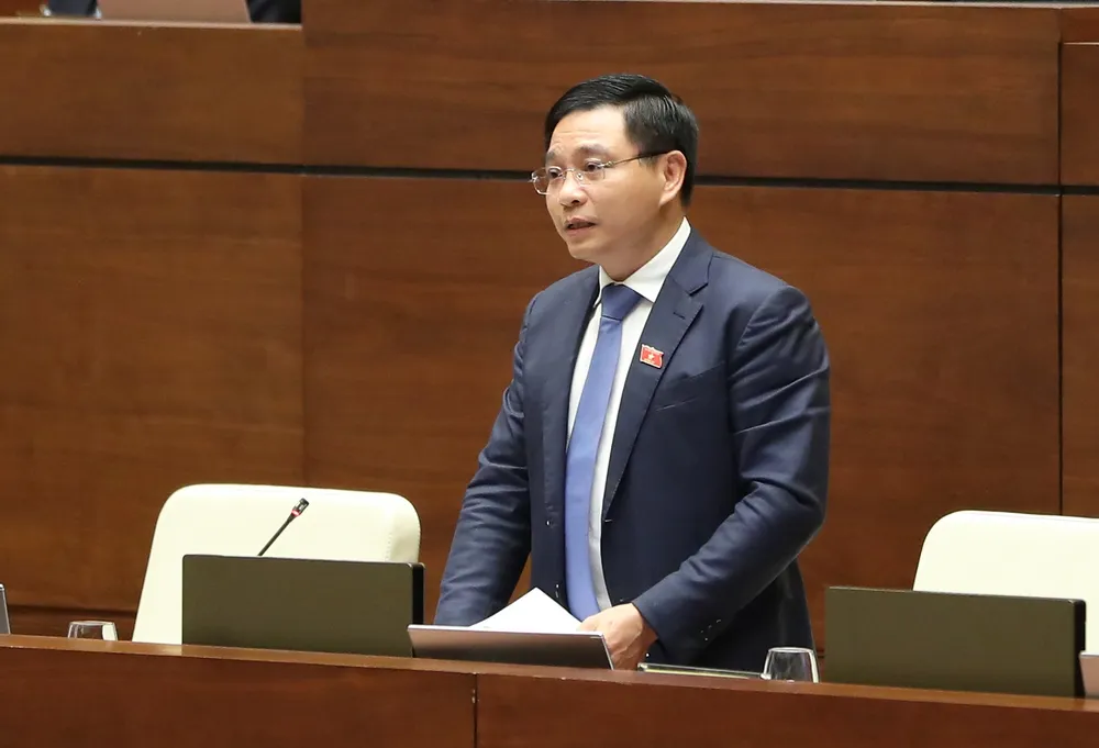 Bộ trưởng Bộ GTVT Nguyễn Văn Thắng trả lời chất vấn. Ảnh: QUANG PHÚC Bộ trưởng Bộ GTVT Nguyễn Văn Thắng trả lời chất vấn. Ảnh: QUANG PHÚC