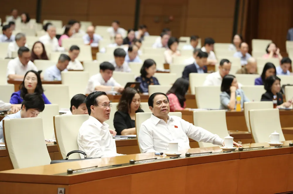 Quốc hội thảo luận ở hội trường về dự án Luật Nhà ở (sửa đổi), sáng 19-6. Ảnh: QUANG PHÚC Quốc hội thảo luận ở hội trường về dự án Luật Nhà ở (sửa đổi), sáng 19-6. Ảnh: QUANG PHÚC