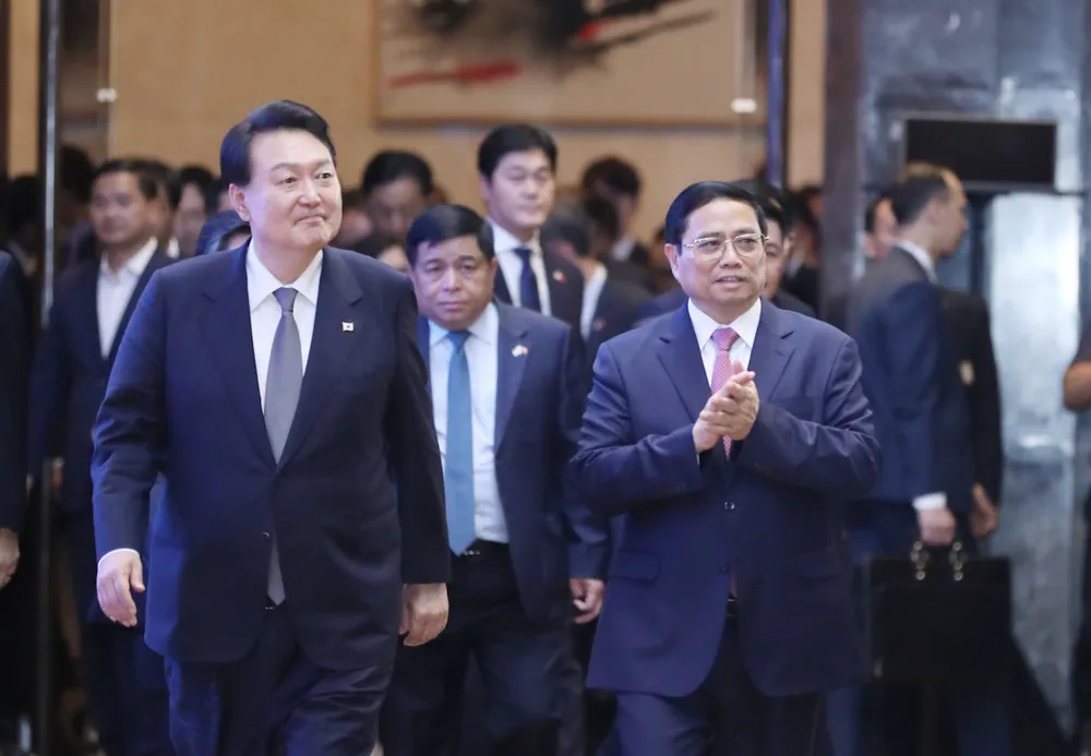 Thủ tướng Phạm Minh Chính và Tổng thống Hàn Quốc Yoon Suk Yeol dự Diễn đàn doanh nghiệp Việt Nam - Hàn Quốc. Ảnh: QUANG PHÚC