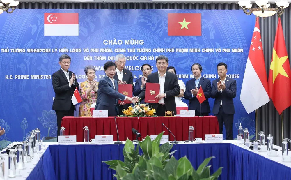 2 Thủ tướng chứng kiến lễ ký kết văn bản thỏa thuận hợp tác giữa Trường ĐH công nghệ Nanyang, Singapore và Trường ĐHQG TPHCM. Ảnh: QUANG PHÚC 2 Thủ tướng chứng kiến lễ ký kết văn bản thỏa thuận hợp tác giữa Trường ĐH công nghệ Nanyang, Singapore và Trường ĐHQG TPHCM. Ảnh: QUANG PHÚC