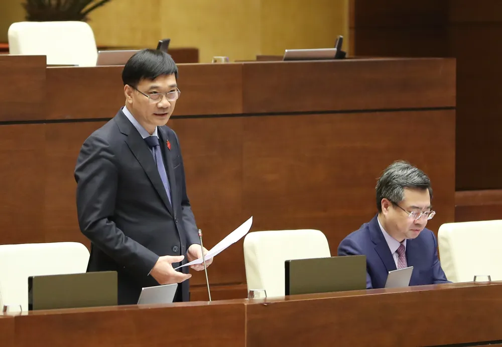 Chủ nhiệm Ủy ban Kinh tế Vũ Hồng Thanh phát biểu giải trình. Ảnh: QUANG PHÚC