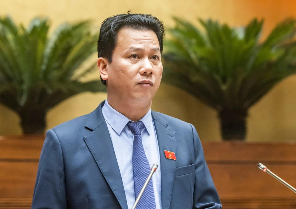 Bộ trưởng Bộ TN-MT Đặng Quốc Khánh. Ảnh: QUANG PHÚC Bộ trưởng Bộ TN-MT Đặng Quốc Khánh.jpg